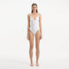 Anahita White V Neck Swimsuit | Moeva | Swimsuit | Each week unveils new pieces—luxury swimwear, fluid resort silhouettes, and elevated summer-to-evening essentials designed to carry you from coastal escapes to city nights.