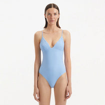 Anahita Baby Blue V Neck Swimsuit | Moeva | Swimsuit | Each week unveils new pieces—luxury swimwear, fluid resort silhouettes, and elevated summer-to-evening essentials designed to carry you from coastal escapes to city nights.