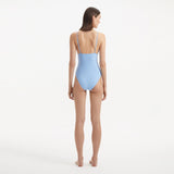 Anahita Baby Blue V Neck Swimsuit | Moeva | Swimsuit | Each week unveils new pieces—luxury swimwear, fluid resort silhouettes, and elevated summer-to-evening essentials designed to carry you from coastal escapes to city nights.