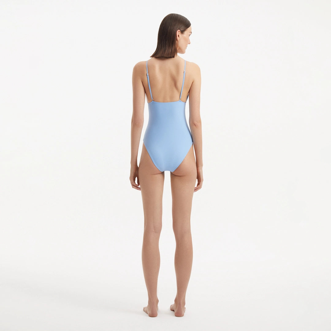 Anahita Baby Blue V Neck Swimsuit | Moeva | Swimsuit | Each week unveils new pieces—luxury swimwear, fluid resort silhouettes, and elevated summer-to-evening essentials designed to carry you from coastal escapes to city nights.