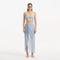 Xander Baby Blue Sheer Maxi Skirt with Gold Button Details | Moeva | Beachwear Skirts | Each week unveils new pieces—luxury swimwear, fluid resort silhouettes, and elevated summer-to-evening essentials designed to carry you from coastal escapes to city nights.