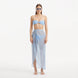 Xander Baby Blue Sheer Maxi Skirt with Gold Button Details | Moeva | Beachwear Skirts | Each week unveils new pieces—luxury swimwear, fluid resort silhouettes, and elevated summer-to-evening essentials designed to carry you from coastal escapes to city nights.