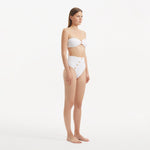 Baia White Bandeau High Waist Bikini Set | Moeva | Bikini Sets | Each week unveils new pieces—luxury swimwear, fluid resort silhouettes, and elevated summer-to-evening essentials designed to carry you from coastal escapes to city nights.