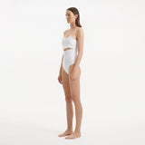 Adria White Bandeu Swimsuit | Moeva | Swimsuit | Each week unveils new pieces—luxury swimwear, fluid resort silhouettes, and elevated summer-to-evening essentials designed to carry you from coastal escapes to city nights.