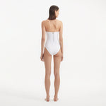Adria White Bandeu Swimsuit | Moeva | Swimsuit | Each week unveils new pieces—luxury swimwear, fluid resort silhouettes, and elevated summer-to-evening essentials designed to carry you from coastal escapes to city nights.