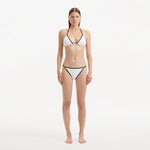 Zarya White Triangle Textured Mid Coverage Bikini Set | Moeva | | Each week unveils new pieces—luxury swimwear, fluid resort silhouettes, and elevated summer-to-evening essentials designed to carry you from coastal escapes to city nights.