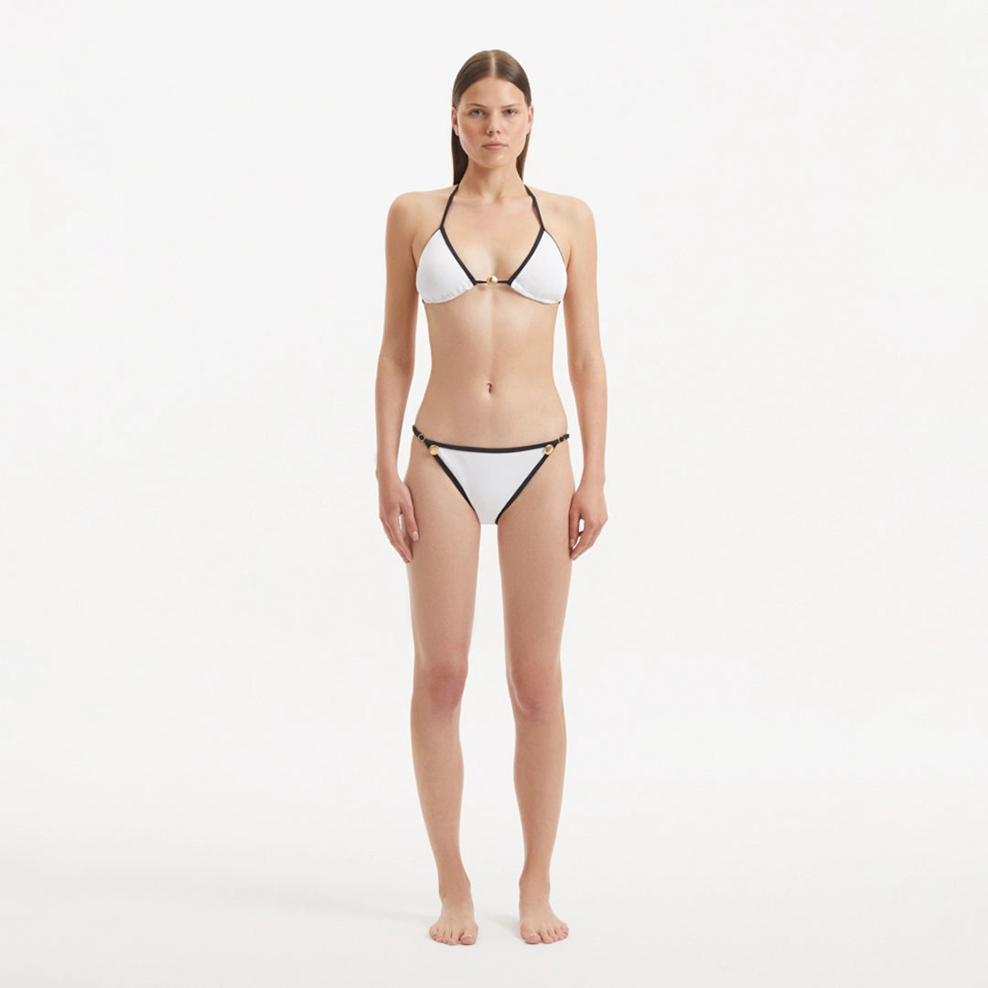 Zarya White Triangle Textured Mid Coverage Bikini Set | Moeva | | Each week unveils new pieces—luxury swimwear, fluid resort silhouettes, and elevated summer-to-evening essentials designed to carry you from coastal escapes to city nights.