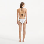 Zarya White Triangle Textured Mid Coverage Bikini Set | Moeva | | Each week unveils new pieces—luxury swimwear, fluid resort silhouettes, and elevated summer-to-evening essentials designed to carry you from coastal escapes to city nights.