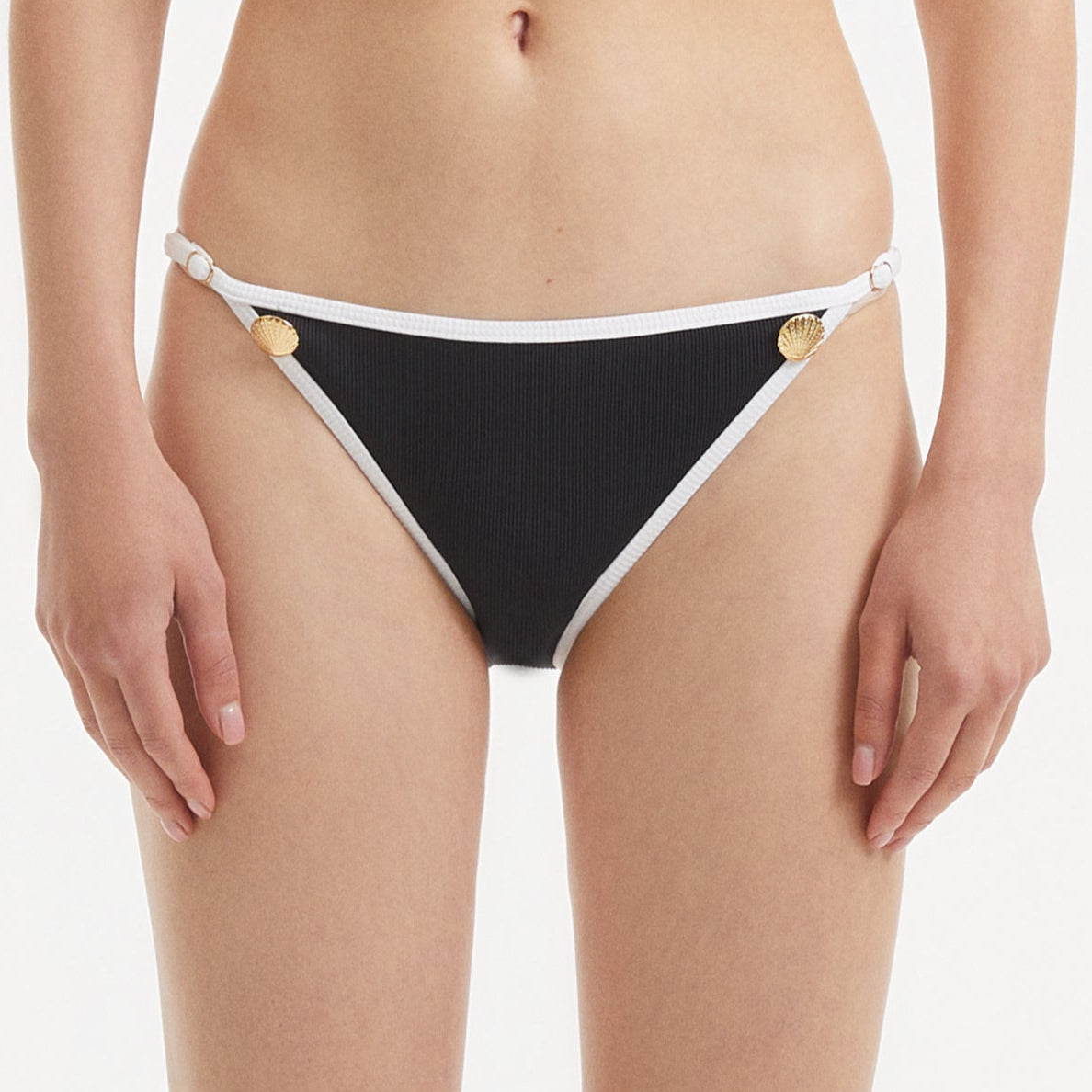 Zarya Black Mid Coverage Bikini Bottom | Moeva | Bikini Bottom | Each week unveils new pieces—luxury swimwear, fluid resort silhouettes, and elevated summer-to-evening essentials designed to carry you from coastal escapes to city nights.