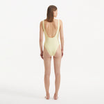Reva Yellow Scoop Neck Textured Swimsuit | Moeva | Swimsuit | Each week unveils new pieces—luxury swimwear, fluid resort silhouettes, and elevated summer-to-evening essentials designed to carry you from coastal escapes to city nights.