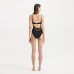 Darya Black Scoop Neck Swimsuit | Moeva | Swimsuit | Each week unveils new pieces—luxury swimwear, fluid resort silhouettes, and elevated summer-to-evening essentials designed to carry you from coastal escapes to city nights.