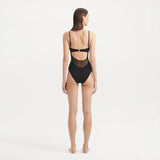 Darya Black Scoop Neck Swimsuit | Moeva | Swimsuit | Each week unveils new pieces—luxury swimwear, fluid resort silhouettes, and elevated summer-to-evening essentials designed to carry you from coastal escapes to city nights.