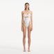 Darya White Scoop Neck Swimsuit | Moeva | Swimsuit | Each week unveils new pieces—luxury swimwear, fluid resort silhouettes, and elevated summer-to-evening essentials designed to carry you from coastal escapes to city nights.