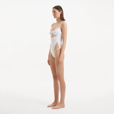 Darya White Scoop Neck Swimsuit | Moeva | Swimsuit | Each week unveils new pieces—luxury swimwear, fluid resort silhouettes, and elevated summer-to-evening essentials designed to carry you from coastal escapes to city nights.