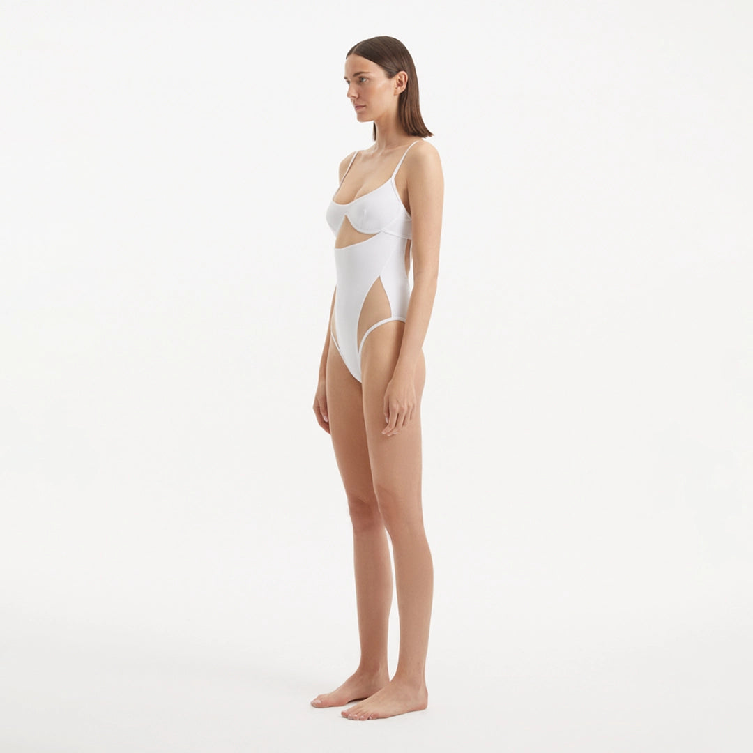 Darya White Scoop Neck Swimsuit | Moeva | Swimsuit | Each week unveils new pieces—luxury swimwear, fluid resort silhouettes, and elevated summer-to-evening essentials designed to carry you from coastal escapes to city nights.