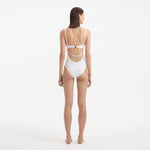 Darya White Scoop Neck Swimsuit | Moeva | Swimsuit | Each week unveils new pieces—luxury swimwear, fluid resort silhouettes, and elevated summer-to-evening essentials designed to carry you from coastal escapes to city nights.
