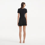 Derin Black Short-Sleeve Mini Dress | Moeva | RTW Dresses | Each week unveils new pieces—luxury swimwear, fluid resort silhouettes, and elevated summer-to-evening essentials designed to carry you from coastal escapes to city nights.