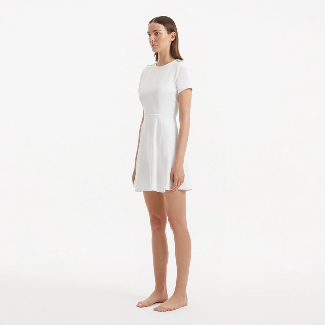 Derin White Short-Sleeve Mini Dress | Moeva | RTW Dresses | Each week unveils new pieces—luxury swimwear, fluid resort silhouettes, and elevated summer-to-evening essentials designed to carry you from coastal escapes to city nights.