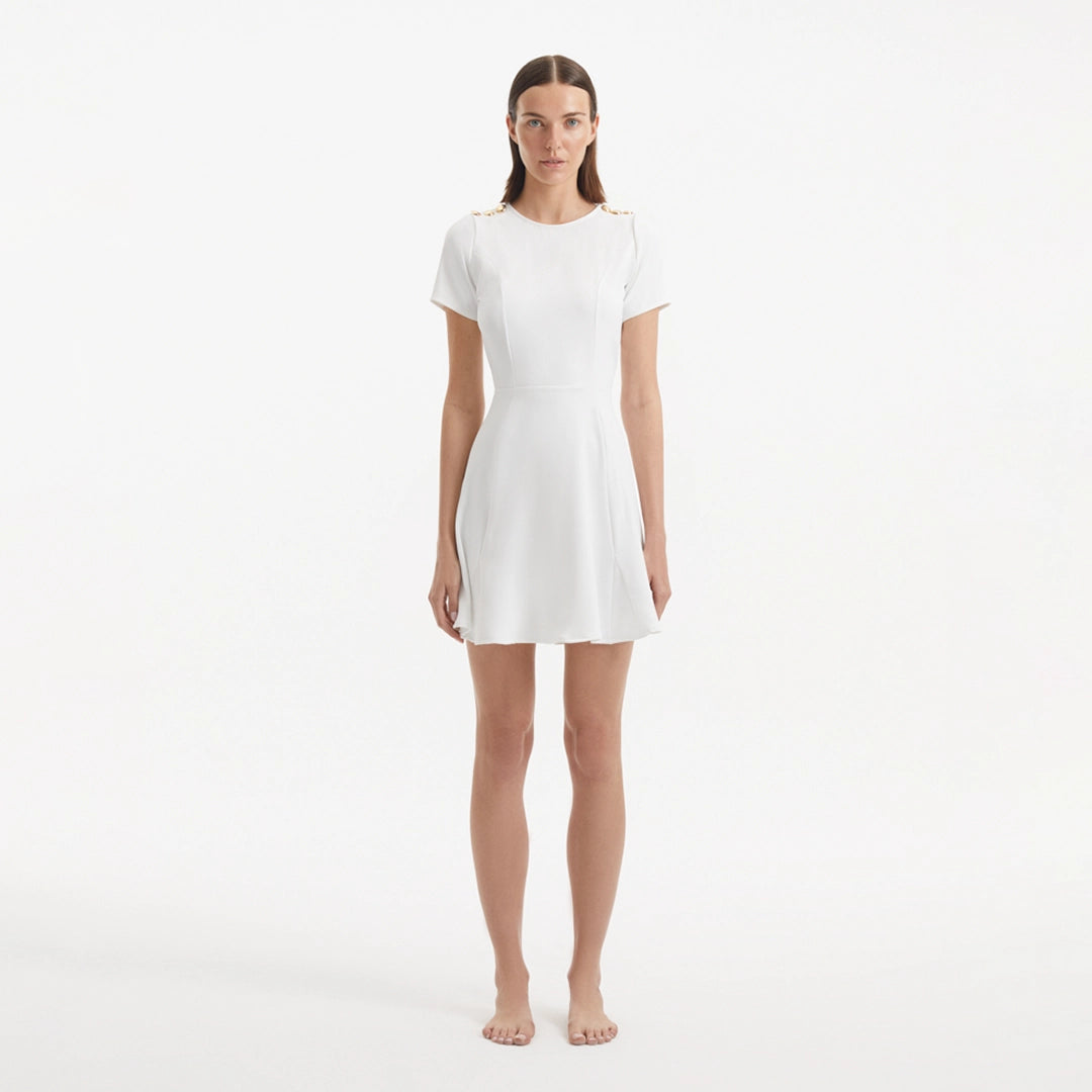 Derin White Short-Sleeve Mini Dress | Moeva | RTW Dresses | Each week unveils new pieces—luxury swimwear, fluid resort silhouettes, and elevated summer-to-evening essentials designed to carry you from coastal escapes to city nights.