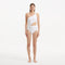 Narelle White One Shoulder Textured Swimsuit | Moeva | Swimsuit | Each week unveils new pieces—luxury swimwear, fluid resort silhouettes, and elevated summer-to-evening essentials designed to carry you from coastal escapes to city nights.