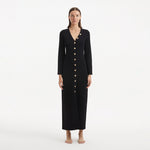 Nira Black Dress | Moeva | RTW Dresses | Each week unveils new pieces—luxury swimwear, fluid resort silhouettes, and elevated summer-to-evening essentials designed to carry you from coastal escapes to city nights.
