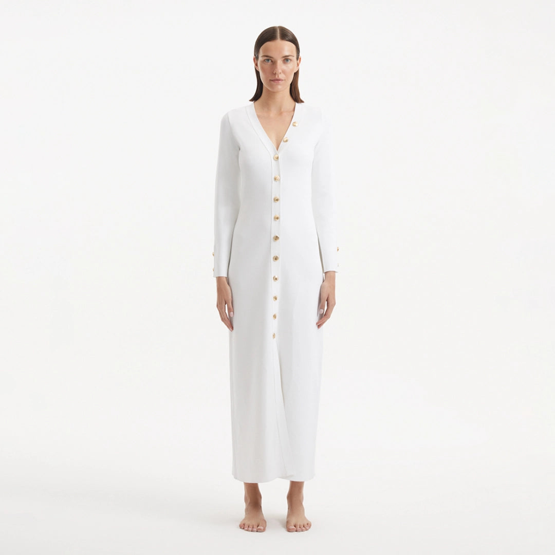 Nira White Dress | Moeva | RTW Dresses | Each week unveils new pieces—luxury swimwear, fluid resort silhouettes, and elevated summer-to-evening essentials designed to carry you from coastal escapes to city nights.