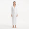 Nira White Dress | Moeva | RTW Dresses | Each week unveils new pieces—luxury swimwear, fluid resort silhouettes, and elevated summer-to-evening essentials designed to carry you from coastal escapes to city nights.