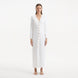 Nira White Dress | Moeva | RTW Dresses | Each week unveils new pieces—luxury swimwear, fluid resort silhouettes, and elevated summer-to-evening essentials designed to carry you from coastal escapes to city nights.