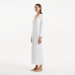Nira White Dress | Moeva | RTW Dresses | Each week unveils new pieces—luxury swimwear, fluid resort silhouettes, and elevated summer-to-evening essentials designed to carry you from coastal escapes to city nights.