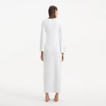 Nira White Dress | Moeva | RTW Dresses | Each week unveils new pieces—luxury swimwear, fluid resort silhouettes, and elevated summer-to-evening essentials designed to carry you from coastal escapes to city nights.