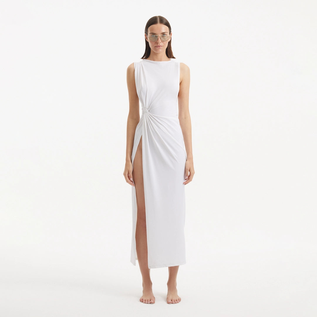 Apollo White Satin Sleeveless Long Dress with Side Slit | Moeva | RTW Dresses | Each week unveils new pieces—luxury swimwear, fluid resort silhouettes, and elevated summer-to-evening essentials designed to carry you from coastal escapes to city nights.