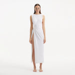 Apollo White Satin Sleeveless Long Dress with Side Slit | Moeva | RTW Dresses | Each week unveils new pieces—luxury swimwear, fluid resort silhouettes, and elevated summer-to-evening essentials designed to carry you from coastal escapes to city nights.
