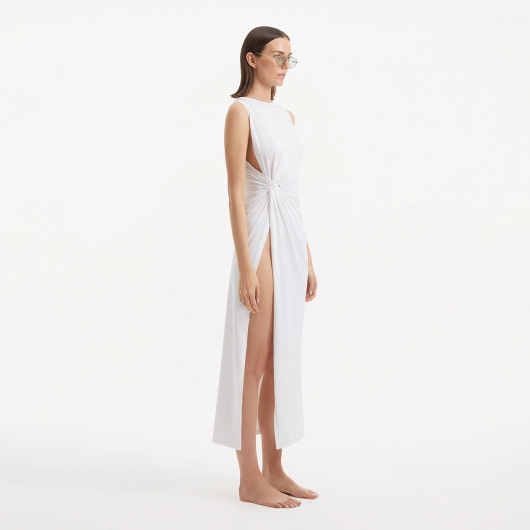 Apollo White Satin Sleeveless Long Dress with Side Slit | Moeva | RTW Dresses | Each week unveils new pieces—luxury swimwear, fluid resort silhouettes, and elevated summer-to-evening essentials designed to carry you from coastal escapes to city nights.