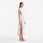 Apollo White Satin Sleeveless Long Dress with Side Slit | Moeva | RTW Dresses | Each week unveils new pieces—luxury swimwear, fluid resort silhouettes, and elevated summer-to-evening essentials designed to carry you from coastal escapes to city nights.