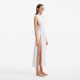 Apollo White Satin Sleeveless Long Dress with Side Slit | Moeva | RTW Dresses | Each week unveils new pieces—luxury swimwear, fluid resort silhouettes, and elevated summer-to-evening essentials designed to carry you from coastal escapes to city nights.