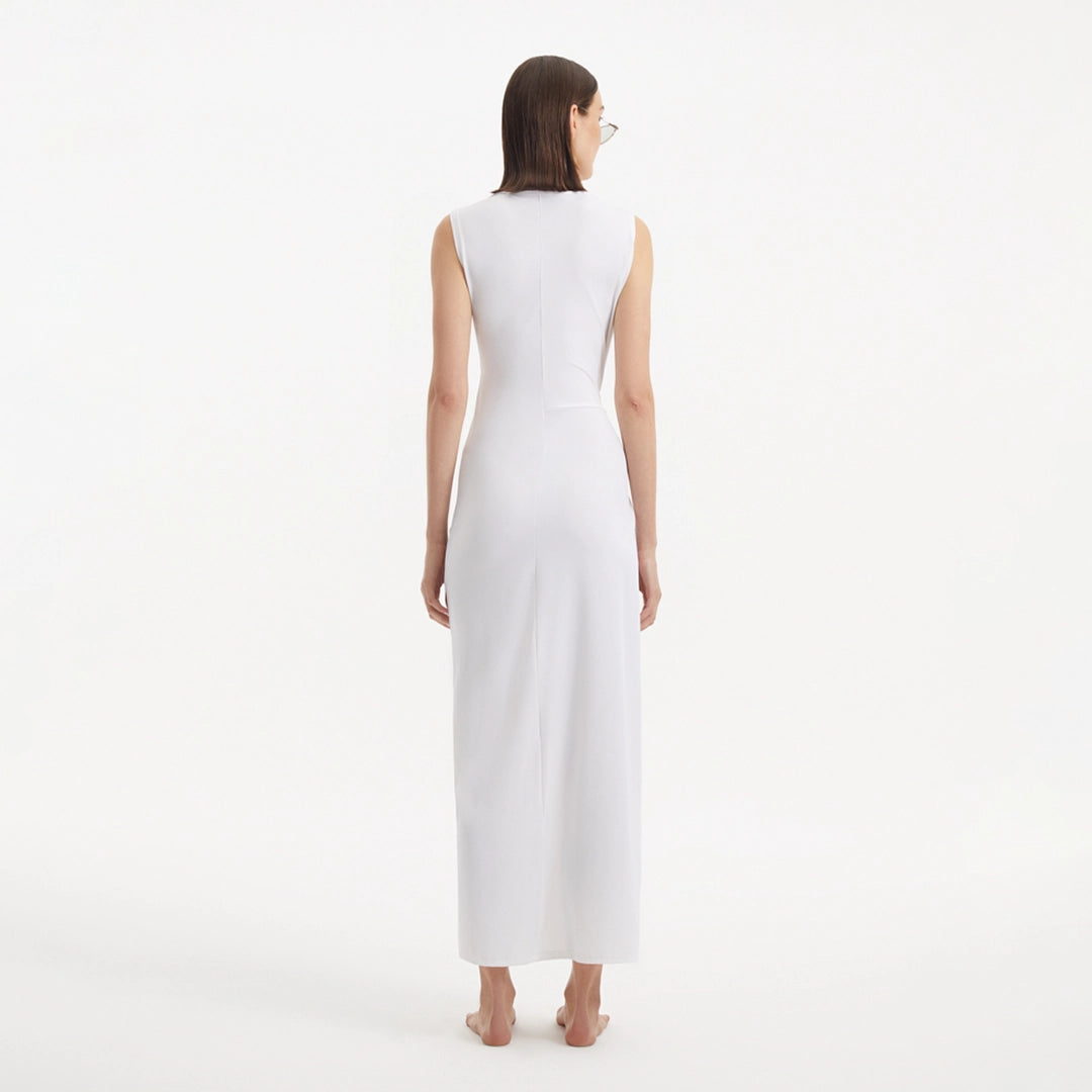 Apollo White Satin Sleeveless Long Dress with Side Slit | Moeva | RTW Dresses | Each week unveils new pieces—luxury swimwear, fluid resort silhouettes, and elevated summer-to-evening essentials designed to carry you from coastal escapes to city nights.