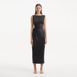 Apollo Black Satin Sleeveless Long Dress with Side Slit | Moeva | RTW Dresses | Each week unveils new pieces—luxury swimwear, fluid resort silhouettes, and elevated summer-to-evening essentials designed to carry you from coastal escapes to city nights.