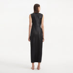 Apollo Black Satin Sleeveless Long Dress with Side Slit | Moeva | RTW Dresses | Each week unveils new pieces—luxury swimwear, fluid resort silhouettes, and elevated summer-to-evening essentials designed to carry you from coastal escapes to city nights.