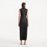 Apollo Black Satin Sleeveless Long Dress with Side Slit | Moeva | RTW Dresses | Each week unveils new pieces—luxury swimwear, fluid resort silhouettes, and elevated summer-to-evening essentials designed to carry you from coastal escapes to city nights.