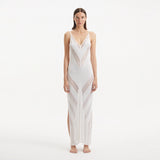 Mimi White Knit Sleeveless Maxi Dress | Moeva | Beachwear Dresses | Each week unveils new pieces—luxury swimwear, fluid resort silhouettes, and elevated summer-to-evening essentials designed to carry you from coastal escapes to city nights.