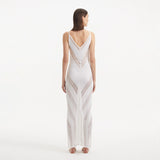 Mimi White Knit Sleeveless Maxi Dress | Moeva | Beachwear Dresses | Each week unveils new pieces—luxury swimwear, fluid resort silhouettes, and elevated summer-to-evening essentials designed to carry you from coastal escapes to city nights.