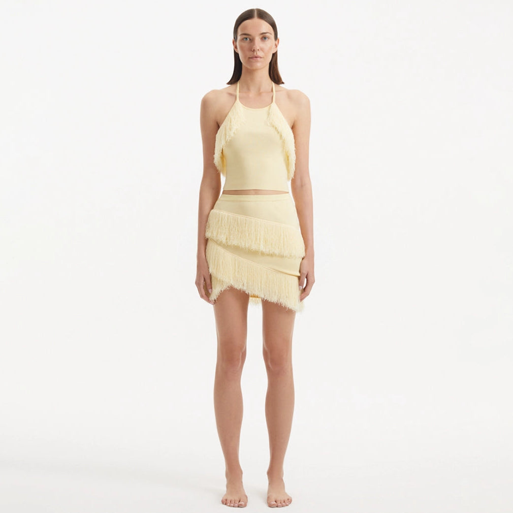 Nebula And Arlo Fringe Asymmetric Yellow Knit Set | Moeva | | Each week unveils new pieces—luxury swimwear, fluid resort silhouettes, and elevated summer-to-evening essentials designed to carry you from coastal escapes to city nights.