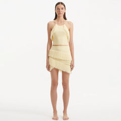 Arlo Yellow Fringe Detail Asymmetric Mini Skirt | Moeva | Skirt | Each week unveils new pieces—luxury swimwear, fluid resort silhouettes, and elevated summer-to-evening essentials designed to carry you from coastal escapes to city nights.