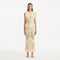 Maris Yellow Knitted Maxi Dress with Fringe and Open Back | Moeva | Dress | Each week unveils new pieces—luxury swimwear, fluid resort silhouettes, and elevated summer-to-evening essentials designed to carry you from coastal escapes to city nights.