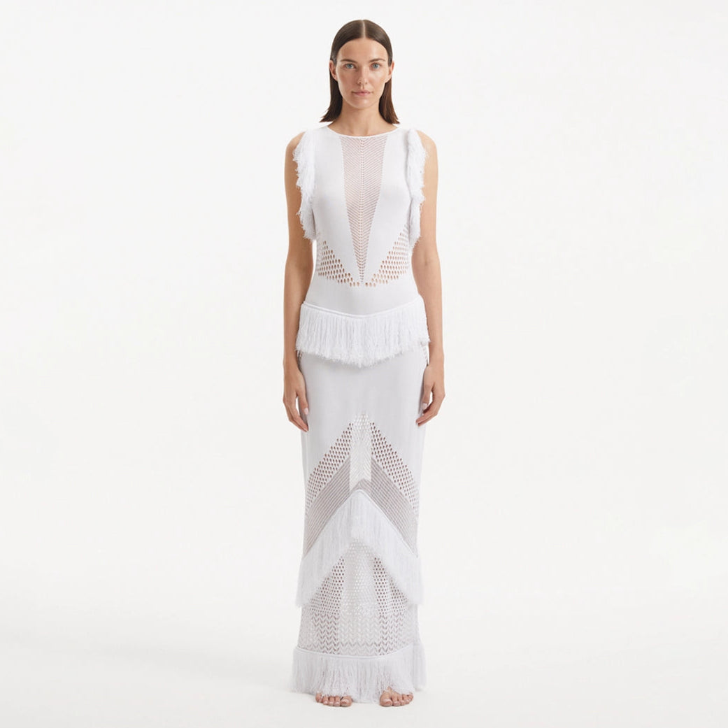 Maris White Knitted Maxi Dress with Fringe and Open Back | Moeva | Dress | Each week unveils new pieces—luxury swimwear, fluid resort silhouettes, and elevated summer-to-evening essentials designed to carry you from coastal escapes to city nights.