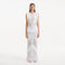 Maris White Knitted Maxi Dress with Fringe and Open Back | Moeva | RTW Dresses | Each week unveils new pieces—luxury swimwear, fluid resort silhouettes, and elevated summer-to-evening essentials designed to carry you from coastal escapes to city nights.