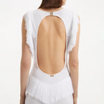 Maris White Knitted Maxi Dress with Fringe and Open Back | Moeva | RTW Dresses | Each week unveils new pieces—luxury swimwear, fluid resort silhouettes, and elevated summer-to-evening essentials designed to carry you from coastal escapes to city nights.
