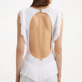 Maris White Knitted Maxi Dress with Fringe and Open Back | Moeva | RTW Dresses | Each week unveils new pieces—luxury swimwear, fluid resort silhouettes, and elevated summer-to-evening essentials designed to carry you from coastal escapes to city nights.