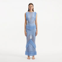 Maris Baby Blue Knitted Maxi Dress with Fringe and Open Back | Moeva | RTW Dresses | Each week unveils new pieces—luxury swimwear, fluid resort silhouettes, and elevated summer-to-evening essentials designed to carry you from coastal escapes to city nights.