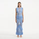 Maris Baby Blue Knitted Maxi Dress with Fringe and Open Back | Moeva | RTW Dresses | Each week unveils new pieces—luxury swimwear, fluid resort silhouettes, and elevated summer-to-evening essentials designed to carry you from coastal escapes to city nights.